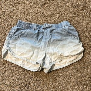 Girls Crazy 8 shorts with elastic band around waist.